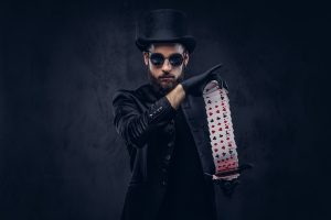 magician-showing-trick-with-playing-cards2